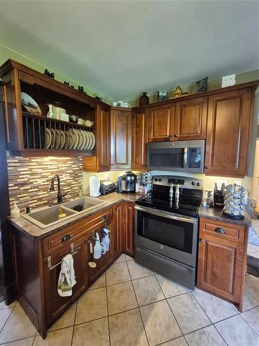 91157 97N Road, Minnedosa, MB - Indoor Photo Showing Kitchen With Double Sink