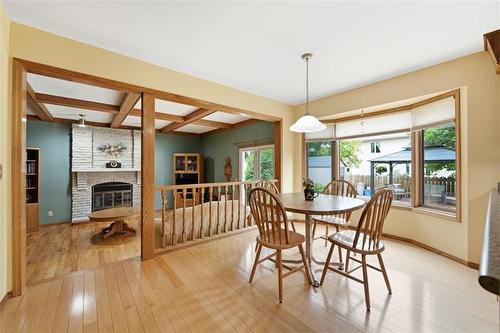 11 Bursill Rd, Winnipeg, MB - Indoor Photo Showing Dining Room With Fireplace