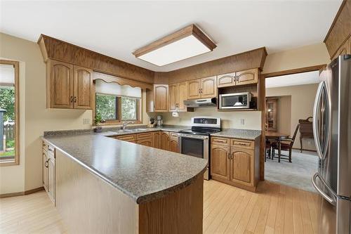 11 Bursill Rd, Winnipeg, MB - Indoor Photo Showing Kitchen With Stainless Steel Kitchen With Double Sink