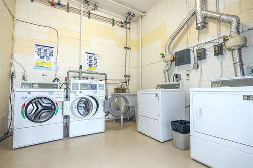 304-118 Scott St, Winnipeg, MB - Indoor Photo Showing Laundry Room