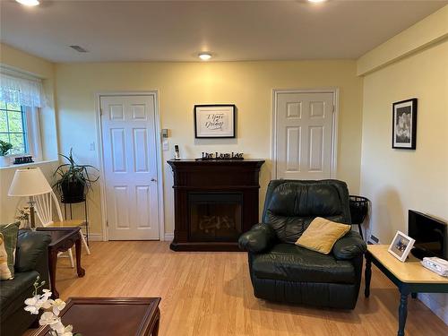 77 Conception Bay Highway, Lakeview, NL - Indoor Photo Showing Living Room With Fireplace