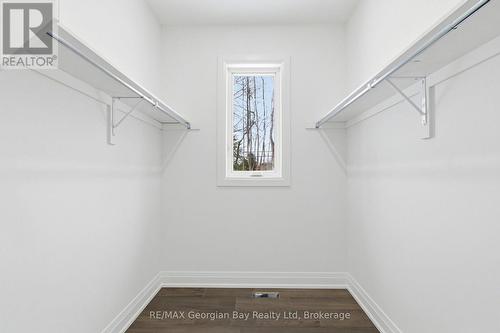 Primary Walk in - 49 Beaufort Crescent, Tiny, ON - Indoor With Storage