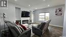 126 Bolstad Way, Saskatoon, SK  - Indoor Photo Showing Living Room With Fireplace 