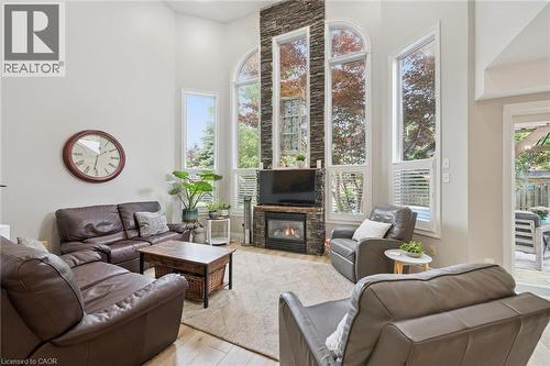 Living room - 916 Rush Meadow Court, Kitchener, ON - Indoor Photo Showing Living Room With Fireplace