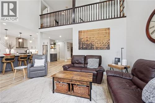 Open-concept living space with high ceilings and light wood-finish flooring - 916 Rush Meadow Court, Kitchener, ON - Indoor Photo Showing Living Room