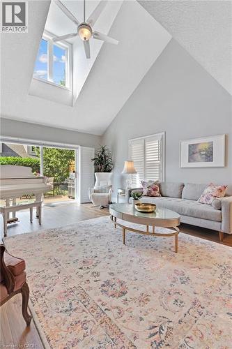 Vaulted ceilings with a prominent skylight and ceiling fan - 350 Doon Valley Drive Unit# 6D, Kitchener, ON - Indoor Photo Showing Living Room