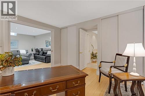 Open concept living area featuring recessed lighting, light wood-finish flooring, and light gray walls - 350 Doon Valley Drive Unit# 6D, Kitchener, ON - Indoor