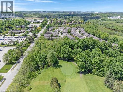 Aerial perspective showcasing extensive green spaces - 350 Doon Valley Drive Unit# 6D, Kitchener, ON - Outdoor With View