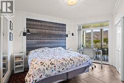 Primary Bedroom with patio access & 3-piece ensuite - 