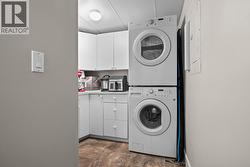 Laundry with built-in cabinetry - 