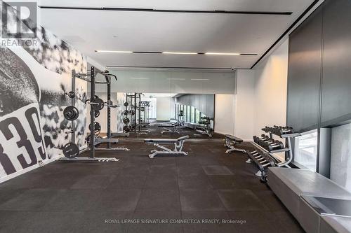 910 - 21 Lawren Harris Square, Toronto, ON - Indoor Photo Showing Gym Room