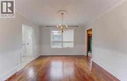 Dining Room with Hardwood Flooring - 