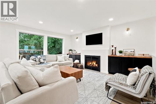 306 Valleyview Boulevard, Caronport, SK - Indoor Photo Showing Living Room With Fireplace