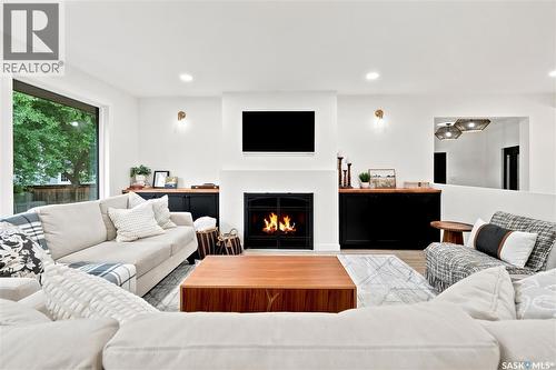 306 Valleyview Boulevard, Caronport, SK - Indoor Photo Showing Living Room With Fireplace