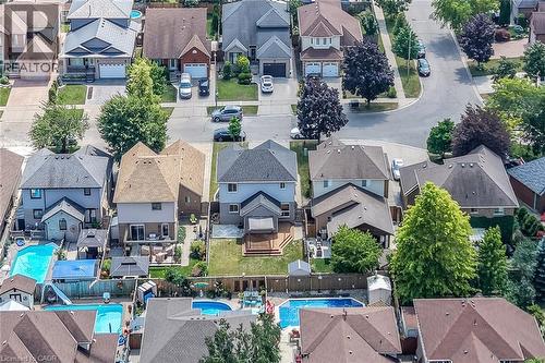21 Springgarden Crescent, Hamilton, ON - Outdoor With In Ground Pool With Deck Patio Veranda With Facade