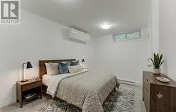 Basement (unit 2) bdrm 3 (AI staged) - 