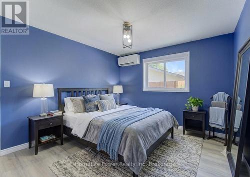 Main floor bedroom 3 AI staged - 136 Dunsmere Drive, Kitchener, ON - Indoor Photo Showing Bedroom