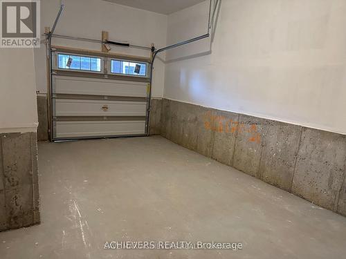 52 Monreau Drive, Brampton, ON - Indoor Photo Showing Garage
