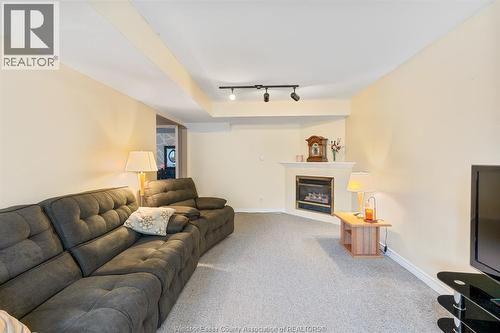 3883 Aristotle Crescent, Windsor, ON - Indoor Photo Showing Living Room With Fireplace