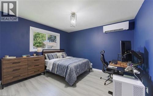 Main floor bedroom 2  AI staged - 136 Dunsmere Drive, Kitchener, ON - Indoor Photo Showing Bedroom