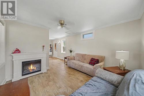 98 Drummond Street E, Perth, ON - Indoor Photo Showing Living Room With Fireplace