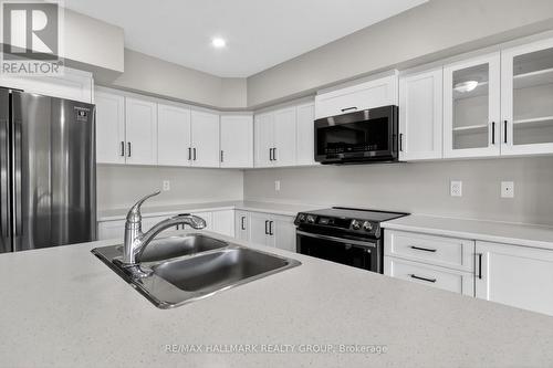 7 Mcphail Road, Carleton Place, ON - Indoor Photo Showing Kitchen With Double Sink