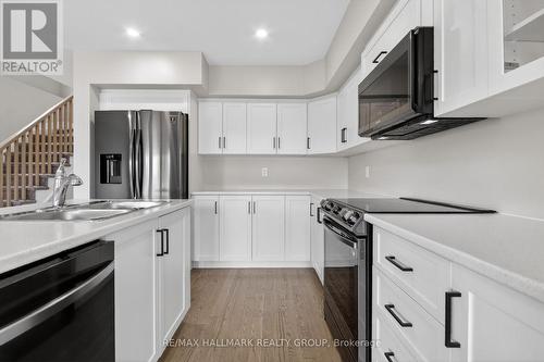 7 Mcphail Road, Carleton Place, ON - Indoor Photo Showing Kitchen With Double Sink