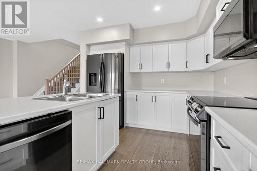7 Mcphail Road, Carleton Place, ON - Indoor Photo Showing Kitchen With Double Sink