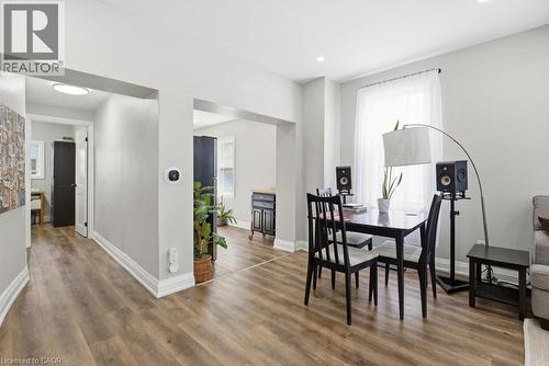 Bright interior featuring wood-finish flooring throughout, recessed lighting, and white baseboards - 773 Lawrence Road, Hamilton, ON - Indoor Photo Showing Other Room