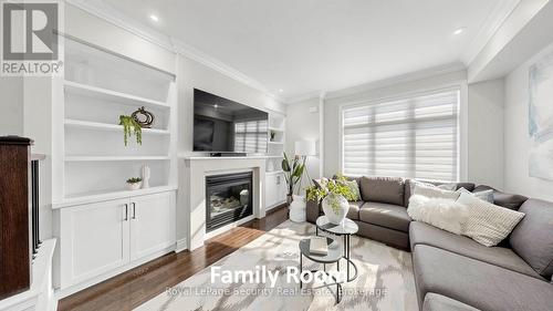 1830 Burnhamthorpe Road E, Mississauga, ON - Indoor Photo Showing Living Room With Fireplace