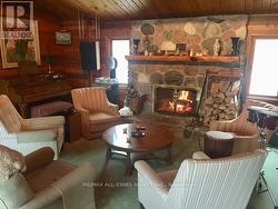 Stone fireplace in main house - 