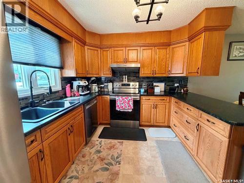 9 1St Avenue, Battleford, SK - Indoor Photo Showing Kitchen With Double Sink