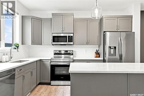 1054 Brighton Gate, Saskatoon, SK - Indoor Photo Showing Kitchen With Stainless Steel Kitchen With Upgraded Kitchen