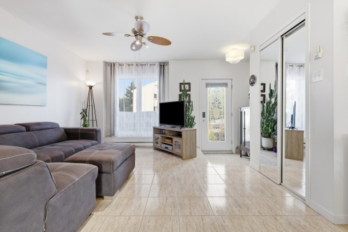 Vue d'ensemble - 437 Rue Marchand, Mascouche, QC - Indoor Photo Showing Living Room