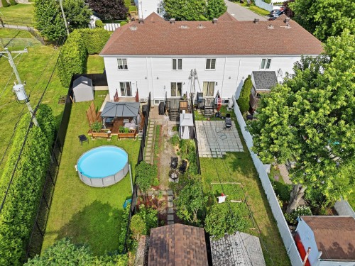 Vue d'ensemble - 437 Rue Marchand, Mascouche, QC - Outdoor With Above Ground Pool