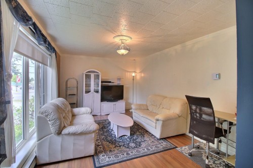 Salon - 1608 Ch. Sullivan, Val-D'Or, QC - Indoor Photo Showing Living Room With Fireplace