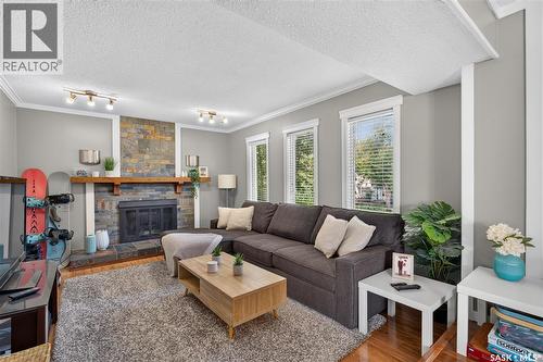 477 22Nd Street E, Prince Albert, SK - Indoor Photo Showing Living Room With Fireplace