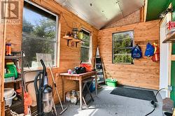 Sun room from main floor leading to outside deck. - 