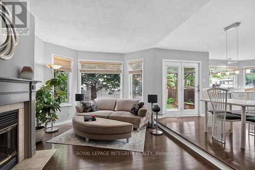 Family Room - 76 Saddlehorn Crescent, Ottawa, ON - Indoor Photo Showing Living Room With Fireplace