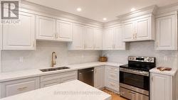 65 FOCH AVENUE  Toronto, ON M8W 3X5