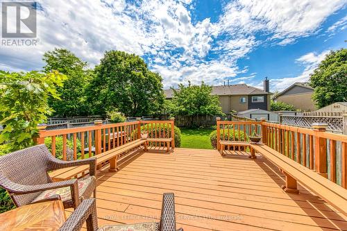 Relaxing on A Large Sundeck with Built-In Benches - 3364 Ingram Road, Mississauga, ON - Outdoor With Deck Patio Veranda