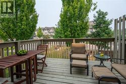 Wood deck with wooden railings - 