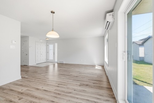 Salon - 1893 Rue Louis-Philippe-Hébert, Chambly, QC - Indoor Photo Showing Other Room