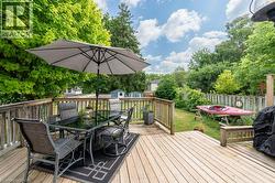 Spacious wood-plank deck with a perimeter railing - 
