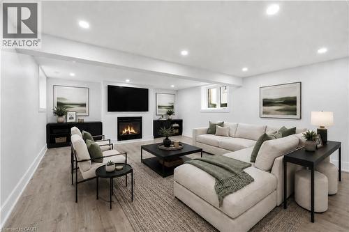 Virtually Staged Photo - 332 Woodworth Drive W, Ancaster, ON - Indoor Photo Showing Living Room With Fireplace