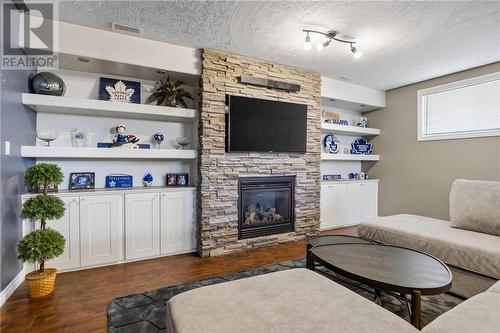 3101 River Road, Val Caron, ON - Indoor Photo Showing Living Room With Fireplace