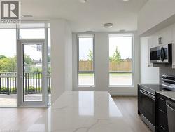 Kitchen island featuring a white countertop with subtle veining - 