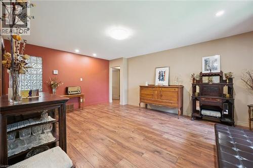Spacious front room with country style laminate flooring and several LED overhead lights - 410 Avenue Road, Cambridge, ON - Indoor Photo Showing Other Room