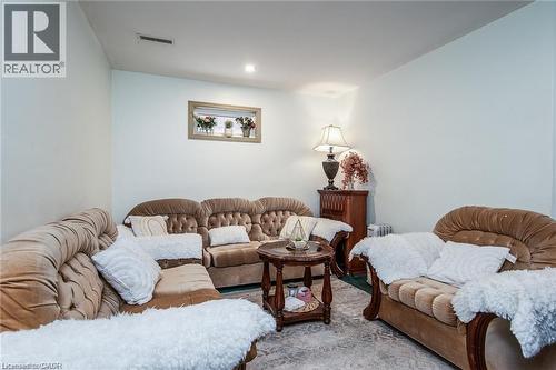 White walls with a single recessed light fixture - 67 Pinemeadow Crescent, Waterloo, ON - Indoor Photo Showing Living Room