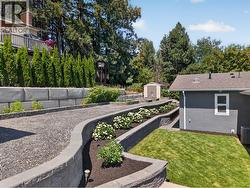 Tiered garden above green space - 